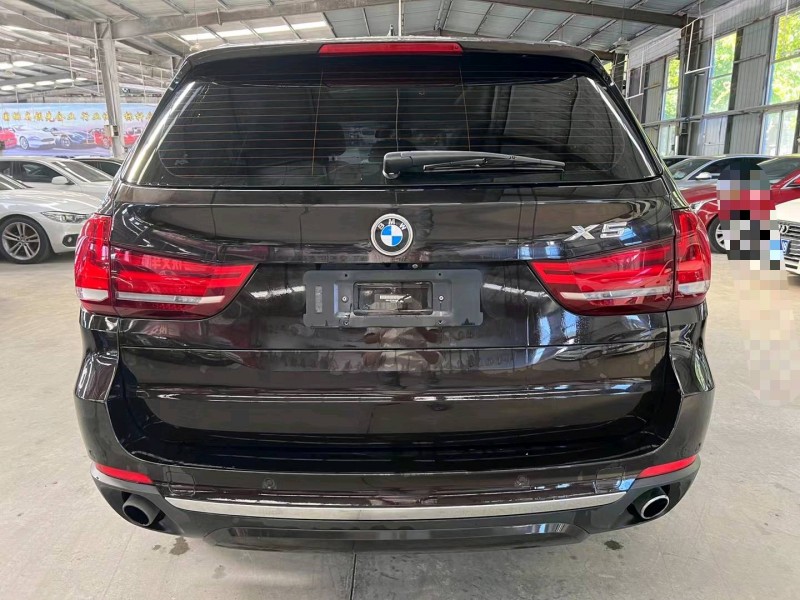 济宁16年宝马X59