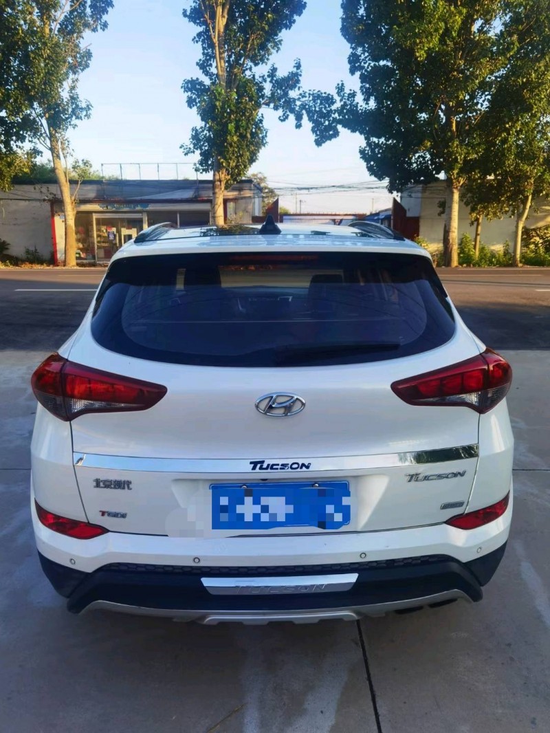 保定16年现代途胜9