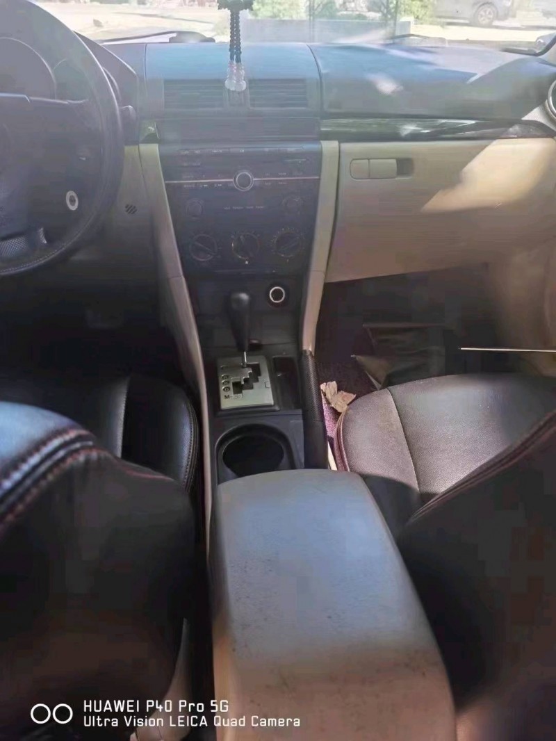 北京12年马自达35