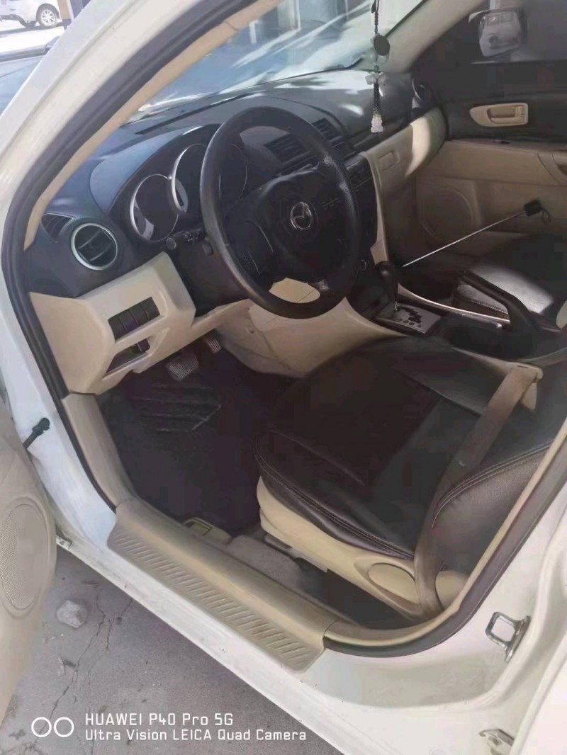 北京12年马自达36