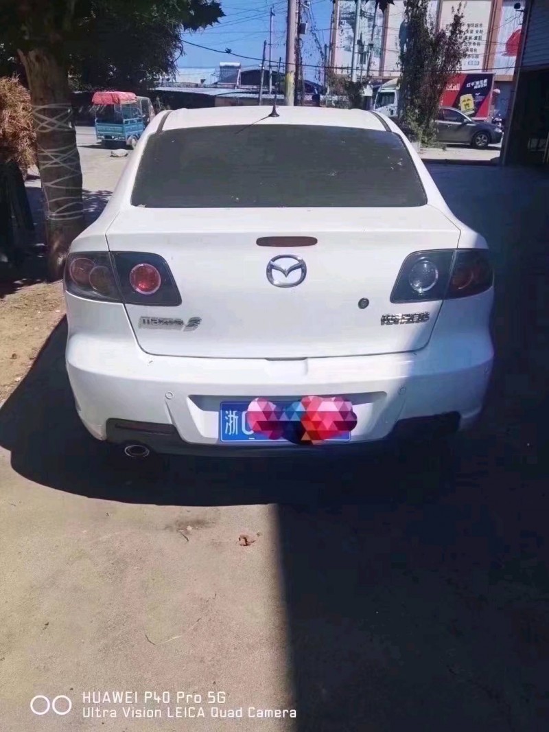 北京12年马自达33