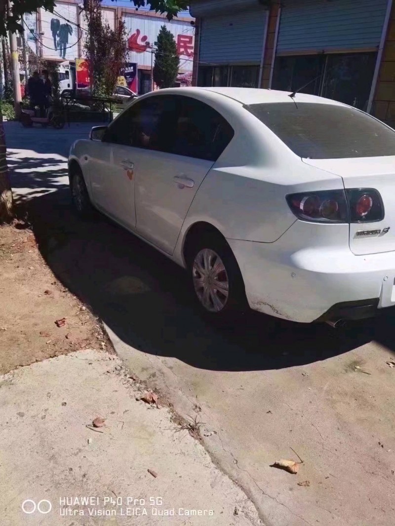 北京12年马自达37