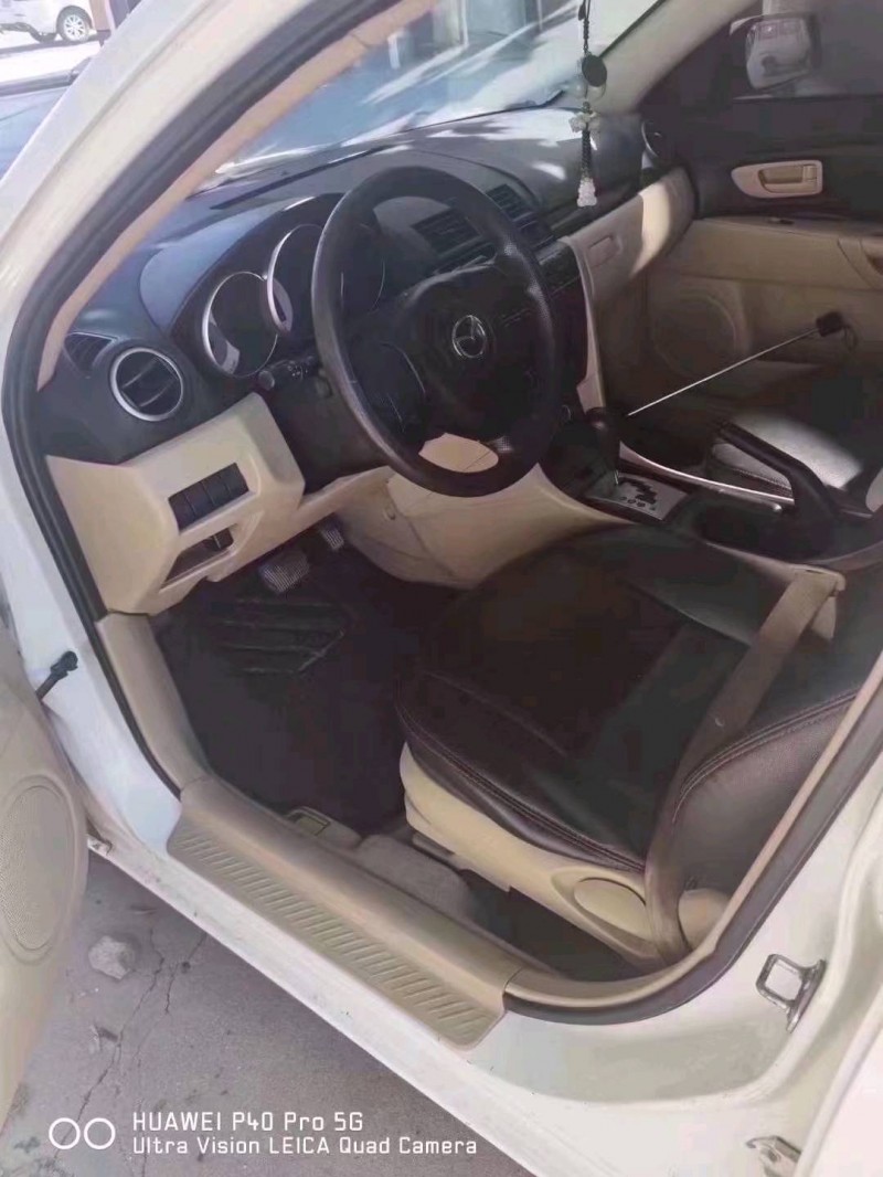 北京12年马自达38