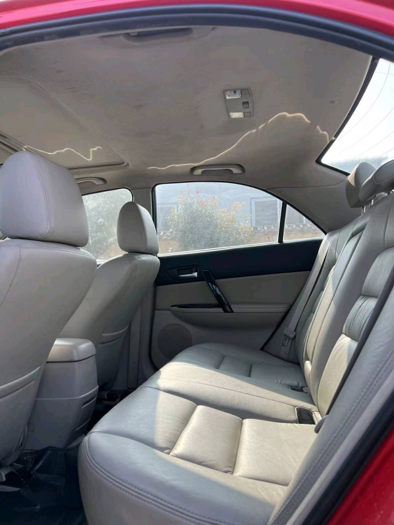 北京12年马自达64