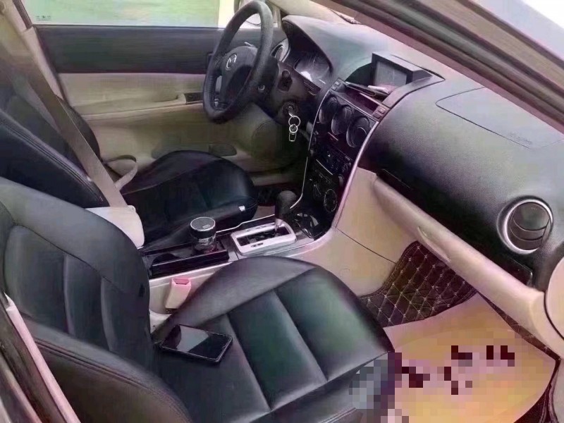 北京09年马自达64