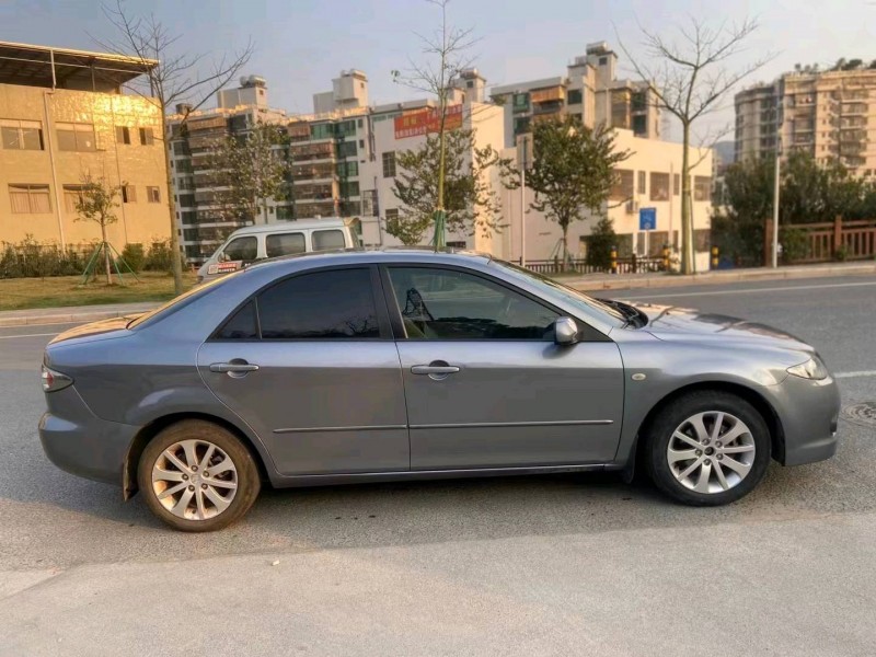 广州12年马自达64
