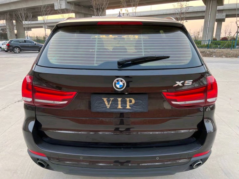 济宁16年宝马X59