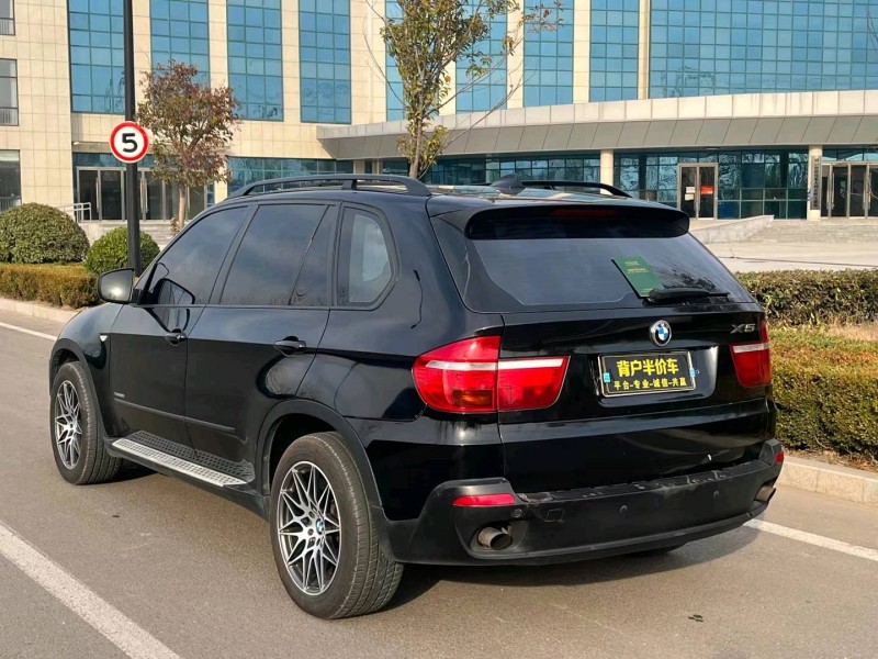 济宁09年宝马X58