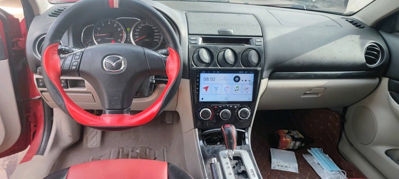 保定12年马自达64