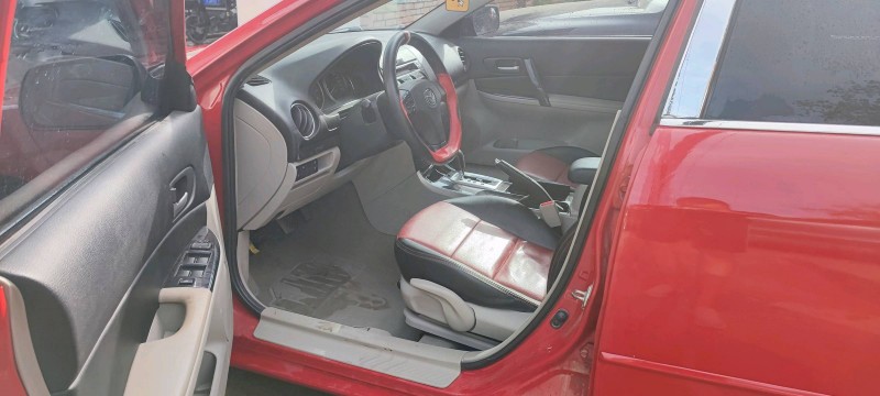 保定12年马自达65