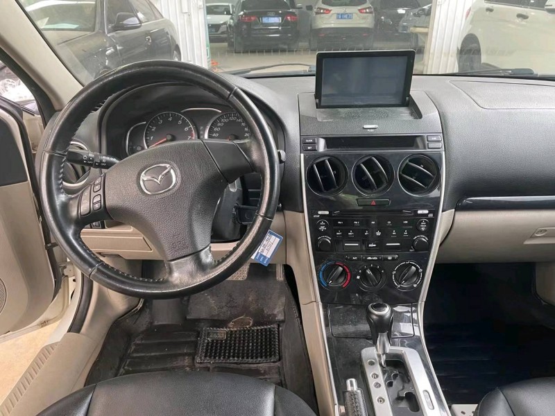 保定12年马自达65