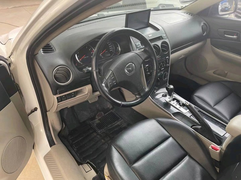 保定12年马自达64