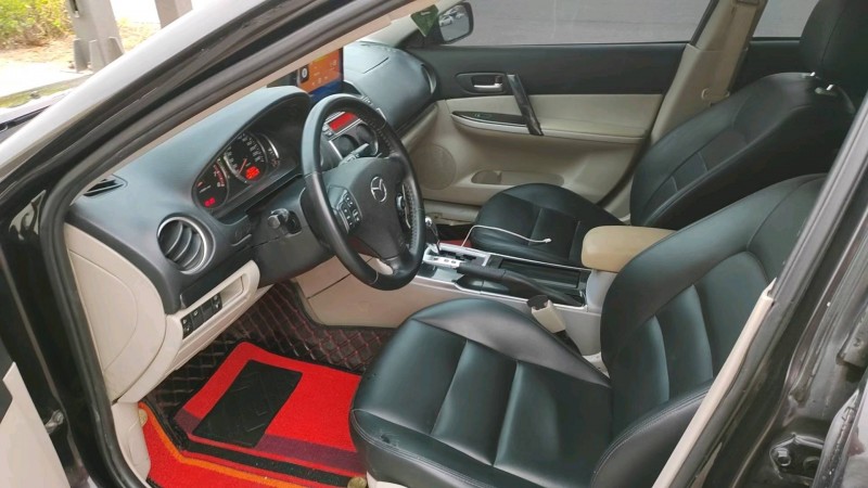 保定12年马自达64