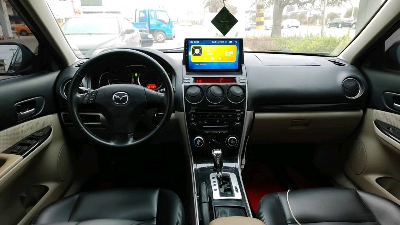 保定12年马自达65