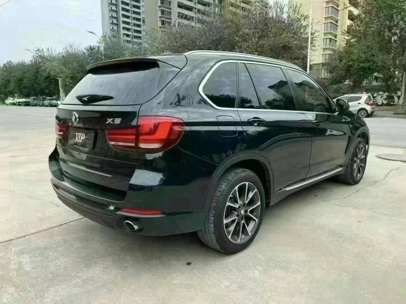 济宁15年宝马X58