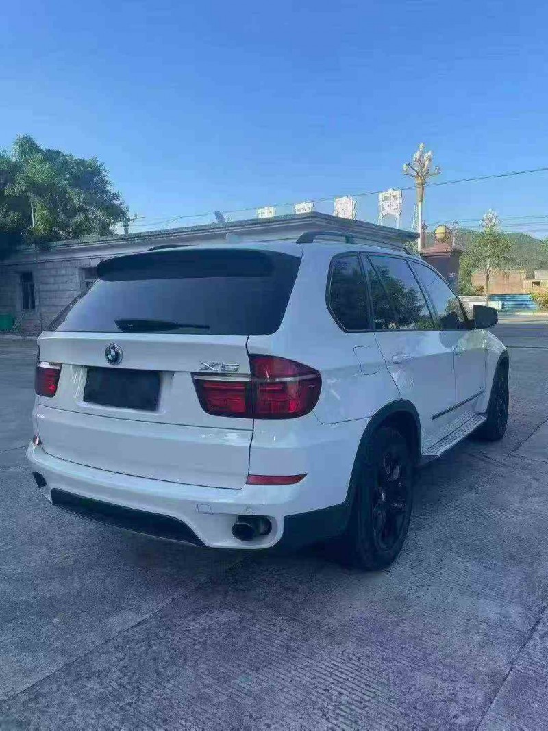 三明12年宝马X58