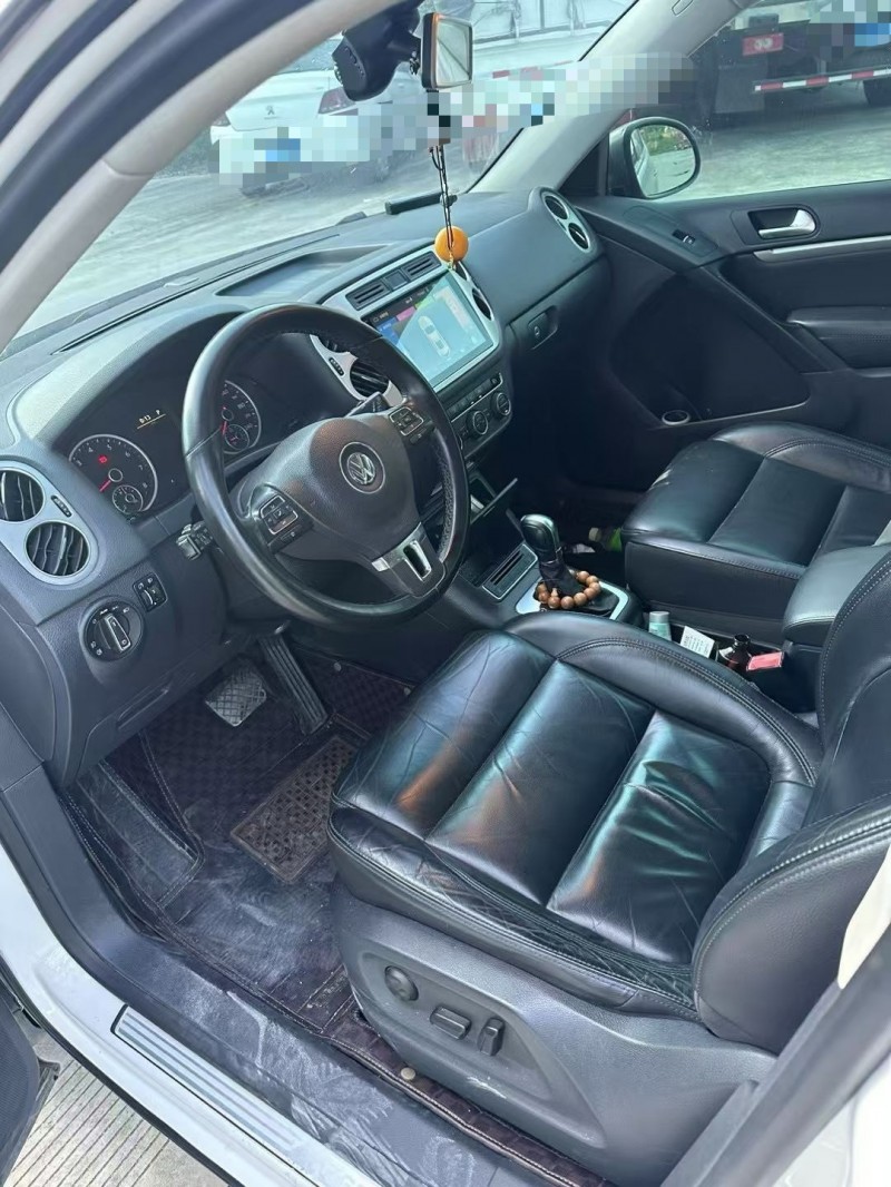 乐山15年大众途观3