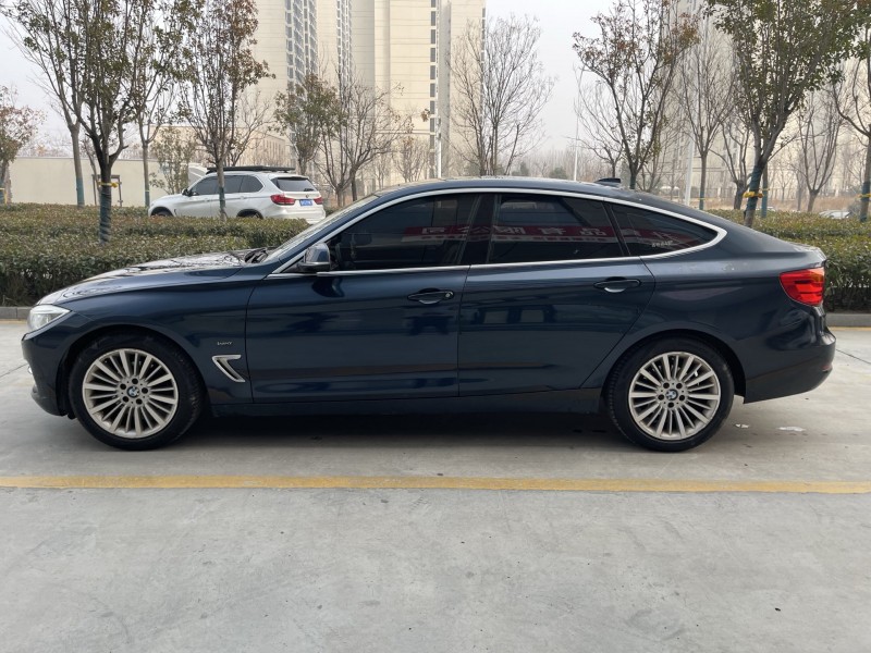 济宁16年宝马3系4