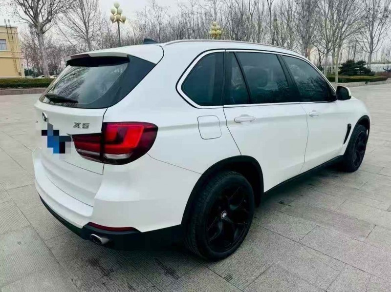 济宁15年宝马X58