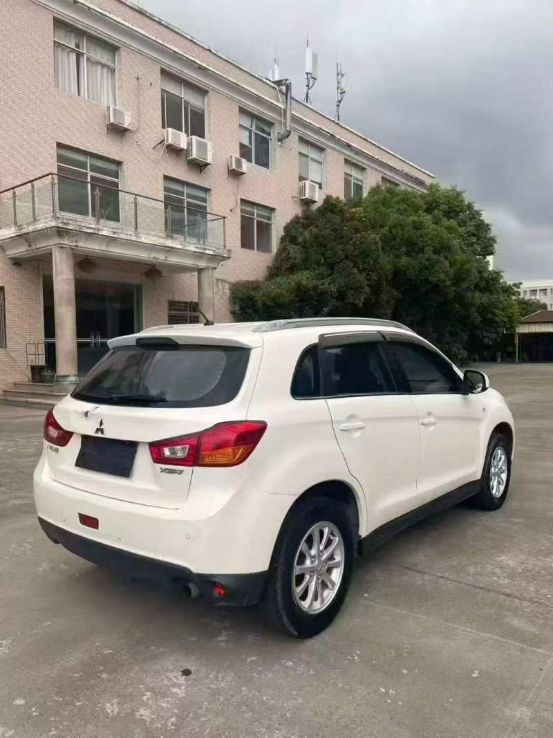 漳州13年三菱勁炫7